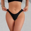 1 pièces mode nouveau Style offre spéciale bouton conception femmes string taille basse solide élégant femme sous-vêtements confortable dame tongs